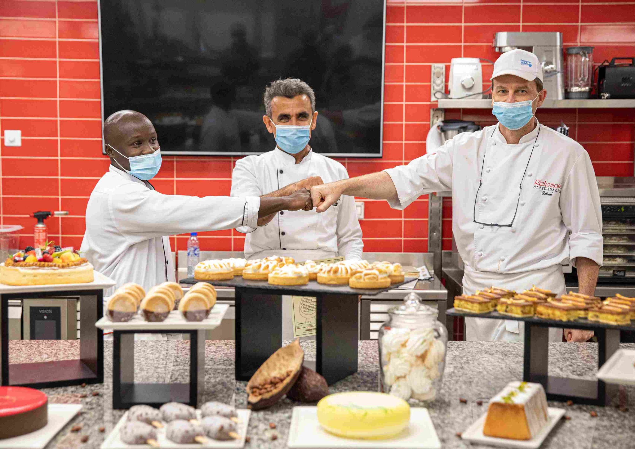Three chefs in a pastry classes session